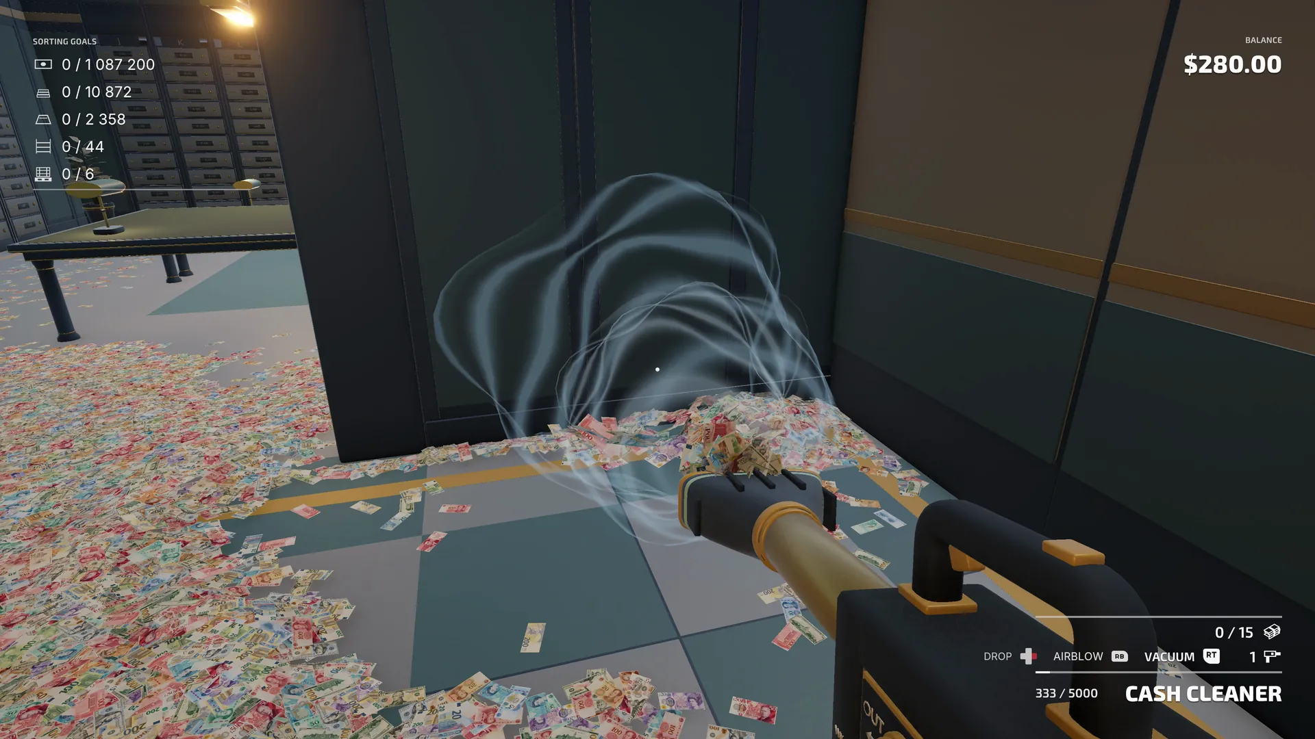 The cash vacuum-blower pulling notes off the floor